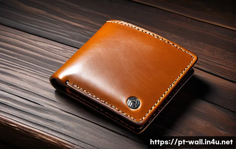 끌로에 마르씨 지갑의 클래식한 디자인 - A minimalist and elegant leather wallet placed on a rustic wooden table, showcasing its clean lines,...